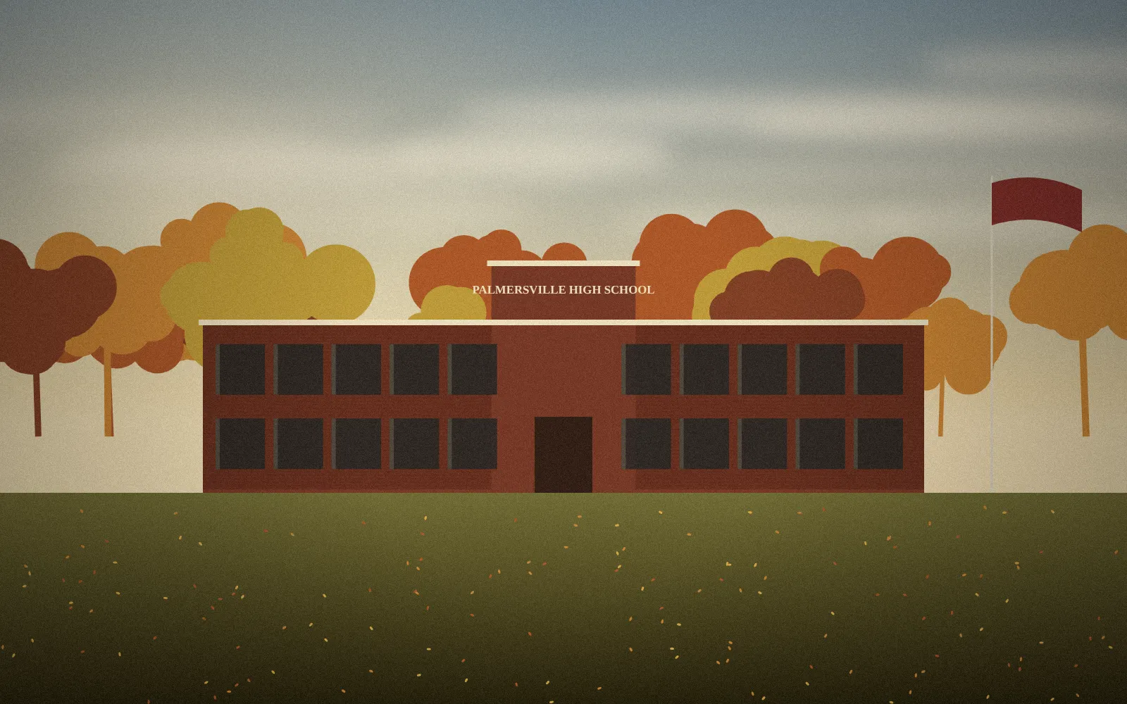 A small-town red brick high school framed by autumn trees